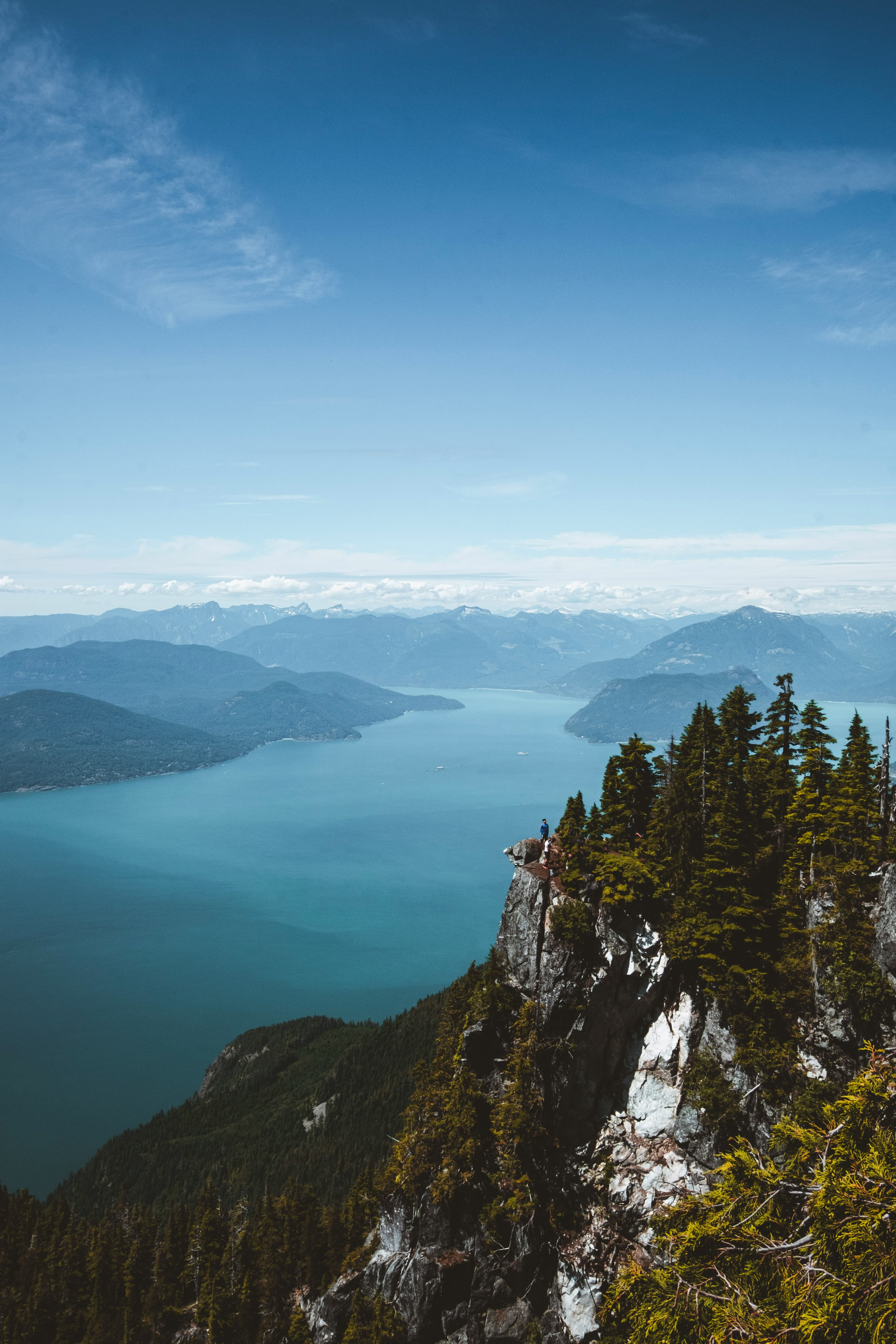 Panoramic aerial view of turquoise Howe Sound fjord from a BC mountain peak